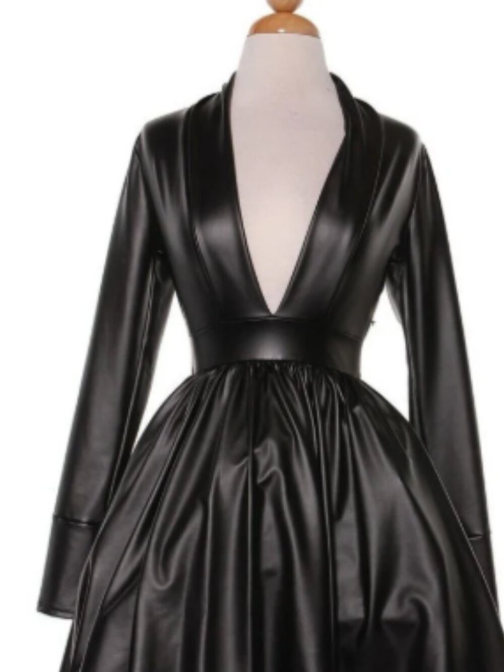 Black faux leather minidress with a deep V-neck and long sleeves.